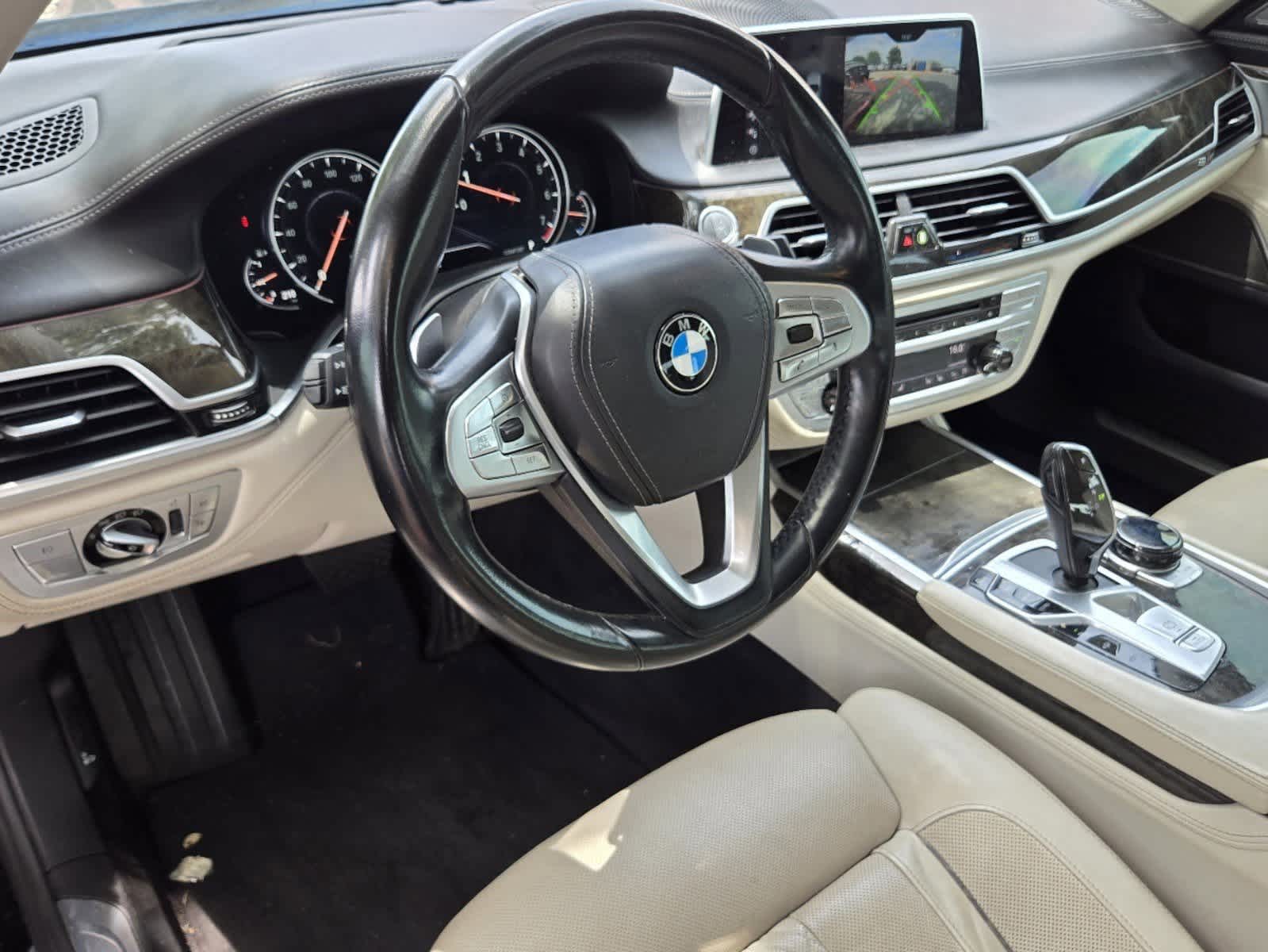 Used 2018 BMW 7 Series 740i with VIN WBA7E2C54JG741678 for sale in Rockwall, TX