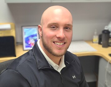 Staff member Chad Hensley from ID_652745