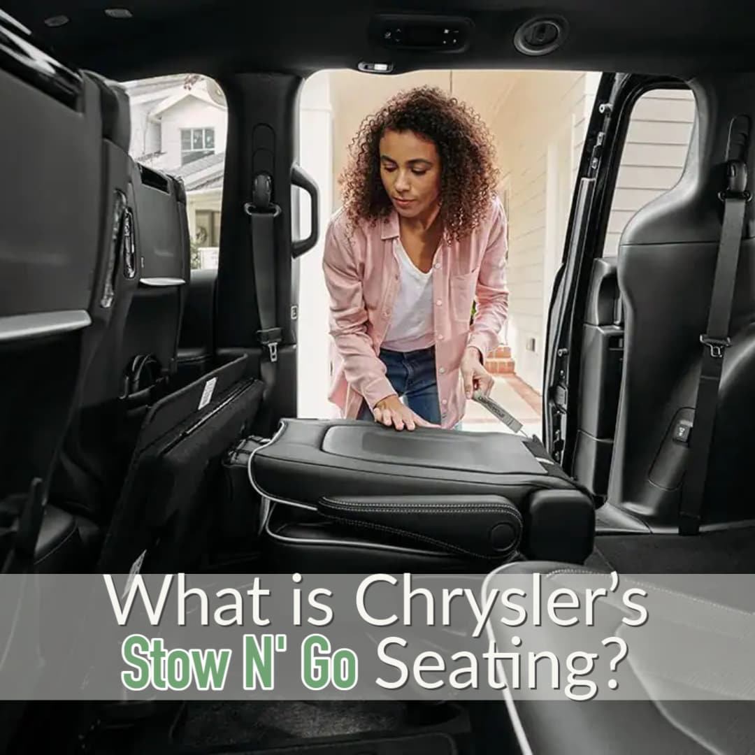 Person Folding Down Seats in Chrysler Minivan