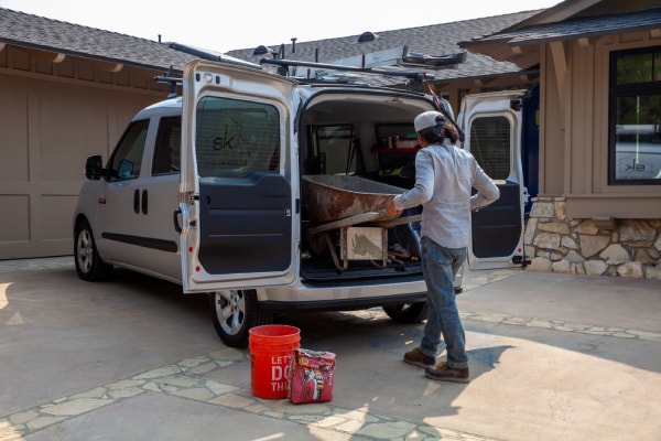 Person loading cargo into back of ProMaster City
