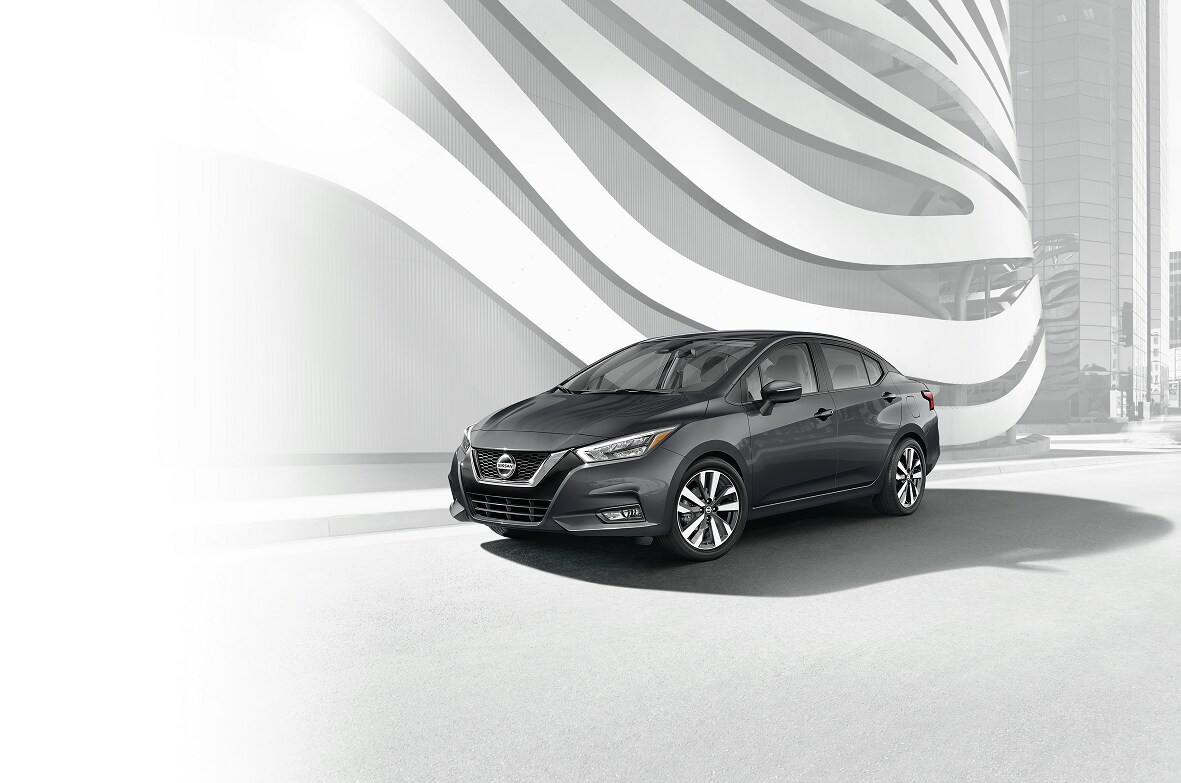 Front 3/4 view of Gray Nissan Versa