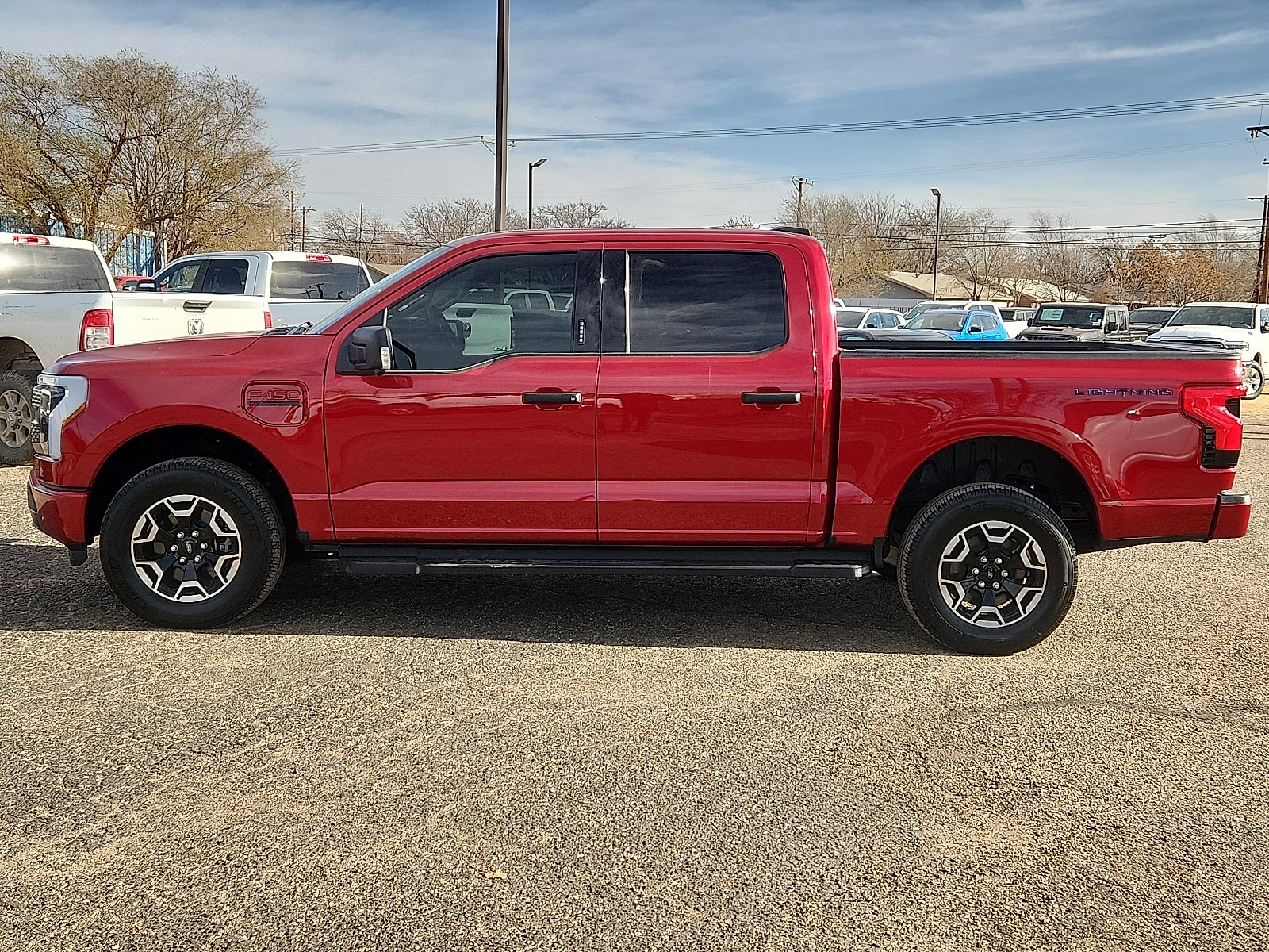 Used 2023 Ford F-150 Lightning XLT with VIN 1FTVW1EL9PWG60610 for sale in Lubbock, TX