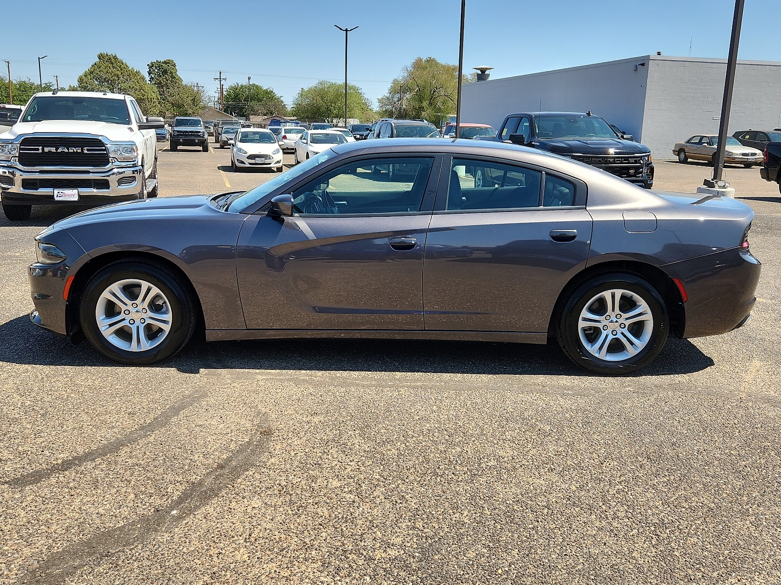 Used 2021 Dodge Charger SXT with VIN 2C3CDXBG5MH647309 for sale in Lubbock, TX