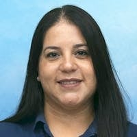 Staff member Onaitsa Gonzalez from ID_e0b90c