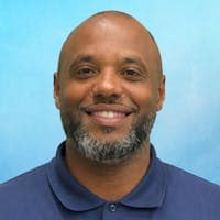Staff member Wilfredo Cruz from ID_e0b90c