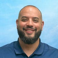 Staff member Jose Soto from ID_98565b