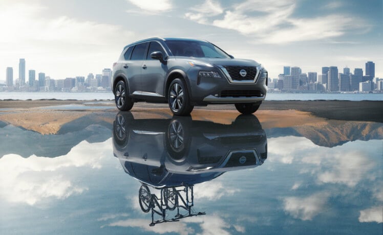 2023 Nissan Rogue Exterior Parked In Reflective Pool By Skyline