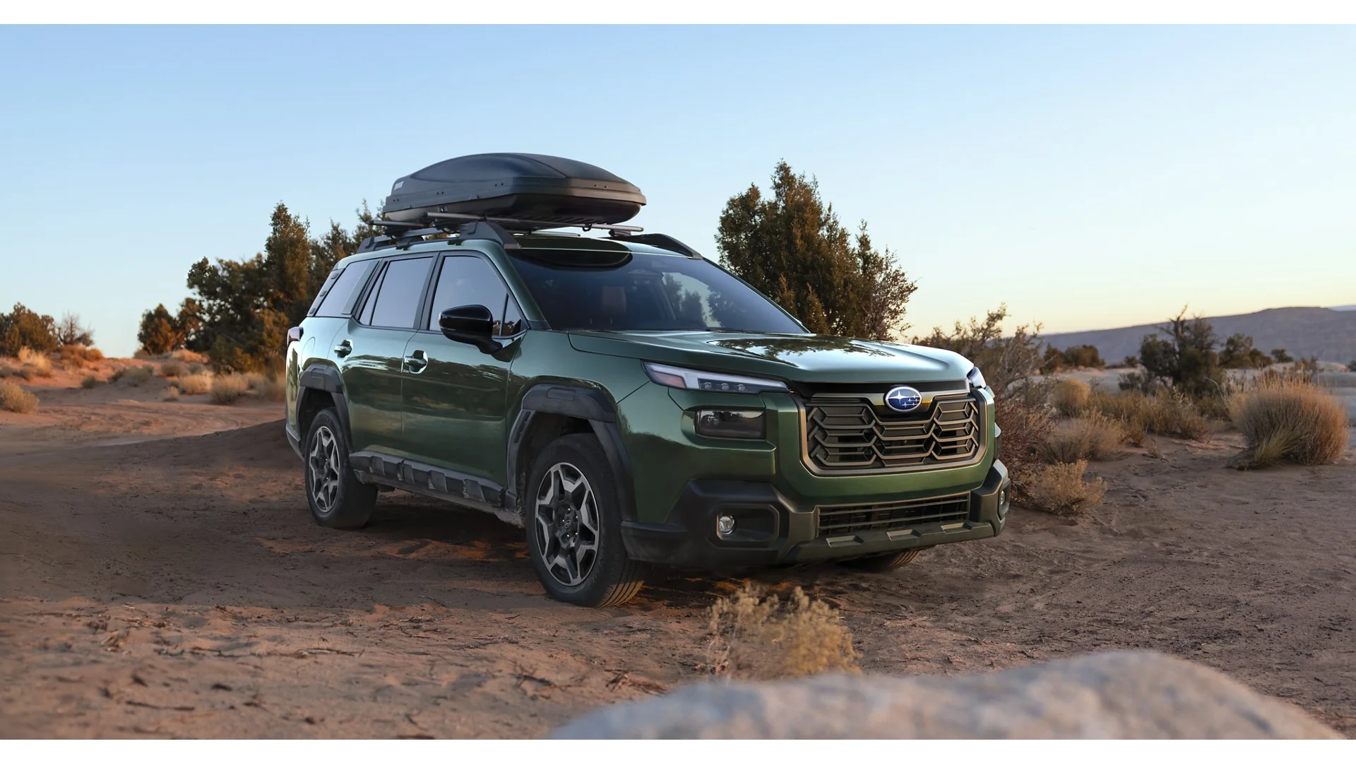 Subaru Outback with a roof cargo box, available at Sport Durst Subaru near Swansboro