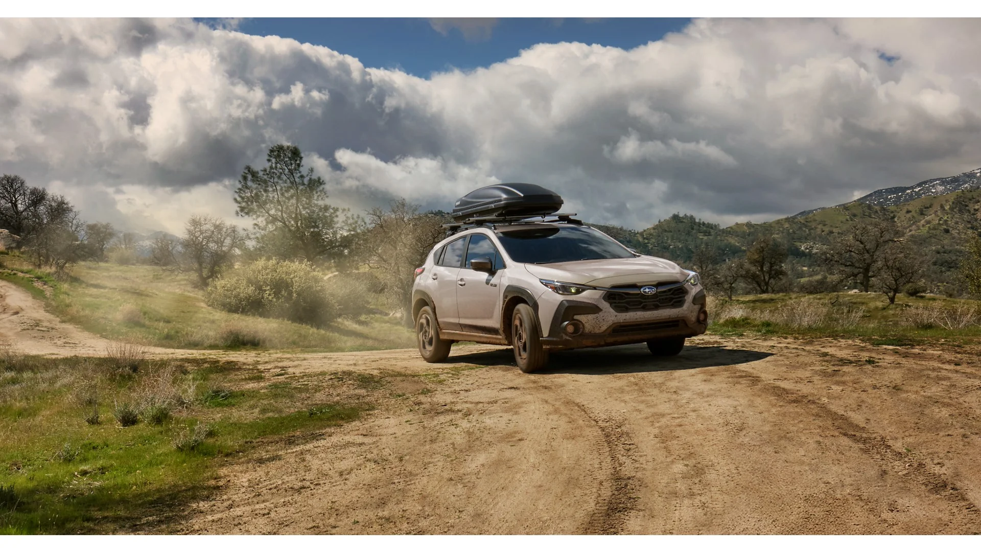 2026 Subaru Crosstrek Limited Hybrid in Sand Dune Pearl exterior side view