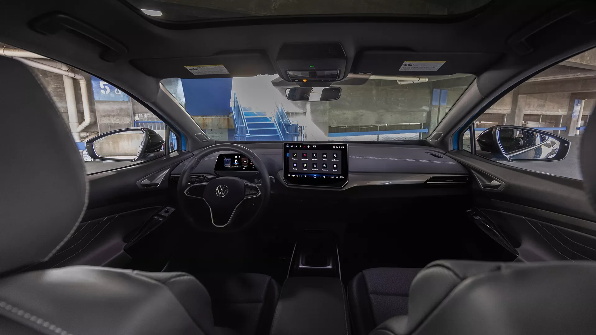 2026 VW ID.4 interior — steering wheel, 12.9-inch touchscreen, and wireless CarPlay standard on every Pro trim