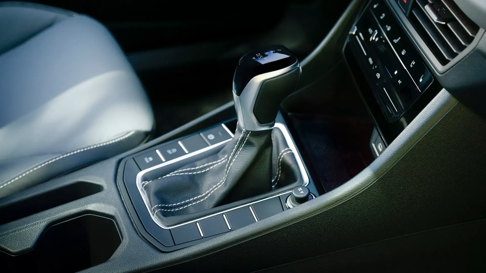 Close up of the gear selector and 8-speed automatic transmission in a Volkswagen Jetta