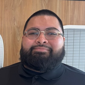 Staff member Carlos Mejia from ID_fd3b50fed6fe