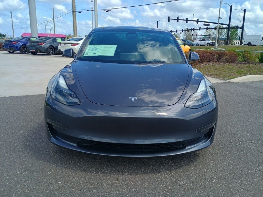 Used 2023 Tesla Model 3 Base with VIN 5YJ3E1EA3PF693454 for sale in Orlando, FL