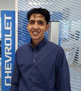 Staff member Adrian Medina from d7c02df7bc41