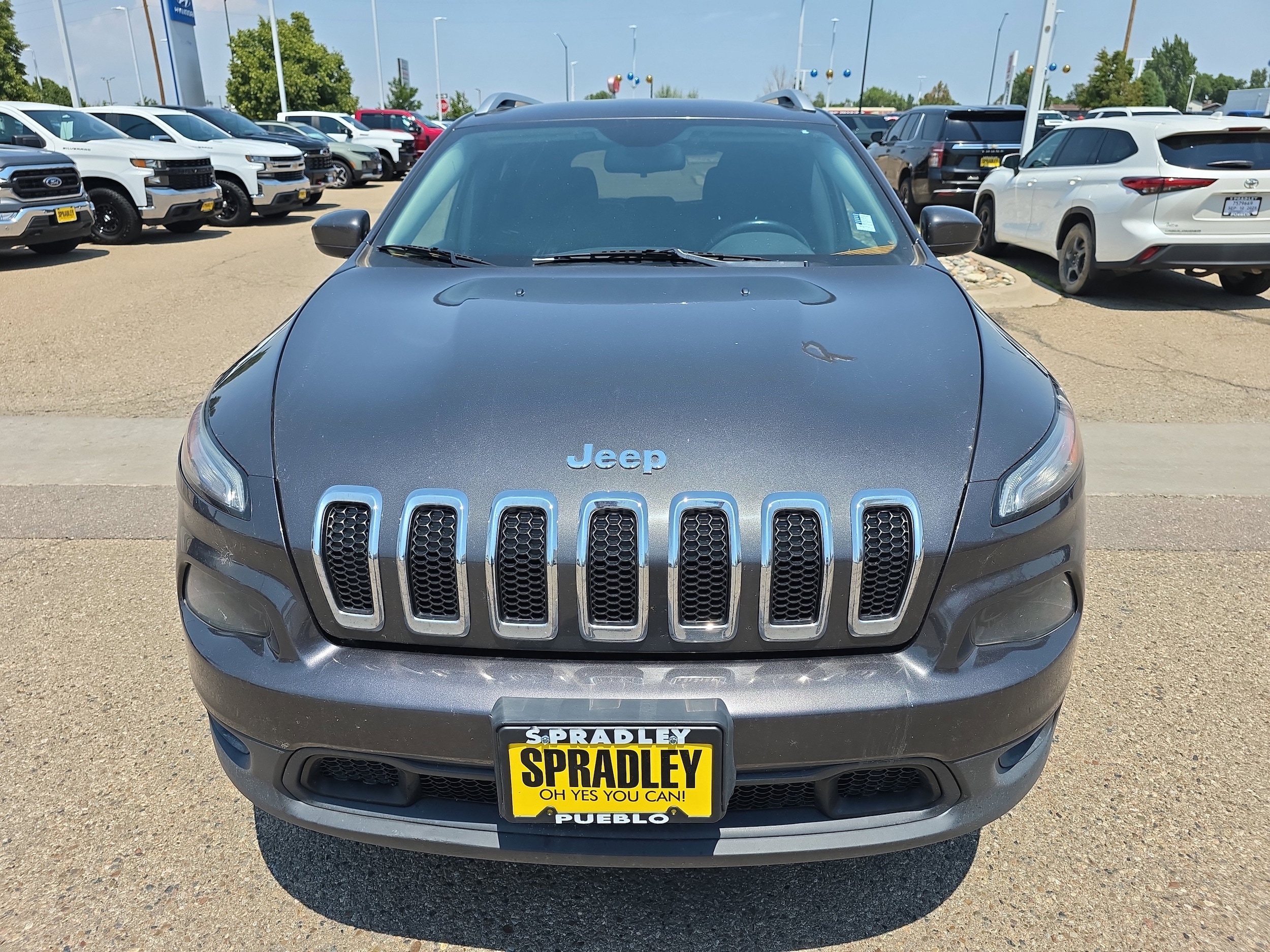 Used 2015 Jeep Cherokee Latitude with VIN 1C4PJMCS9FW668143 for sale in Pueblo, CO
