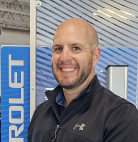 Staff member Joey Musso from d7c02df7bc41