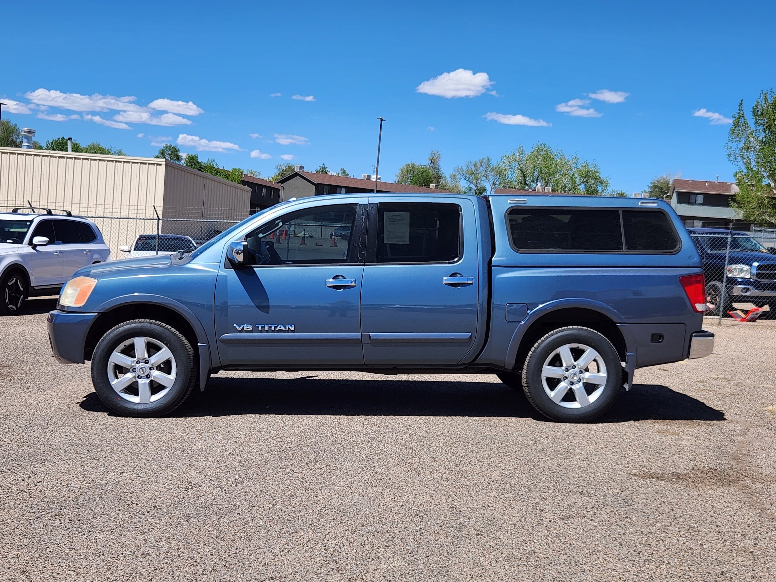 Used 2011 Nissan Titan SL with VIN 1N6BA0EC7BN321366 for sale in Pueblo, CO