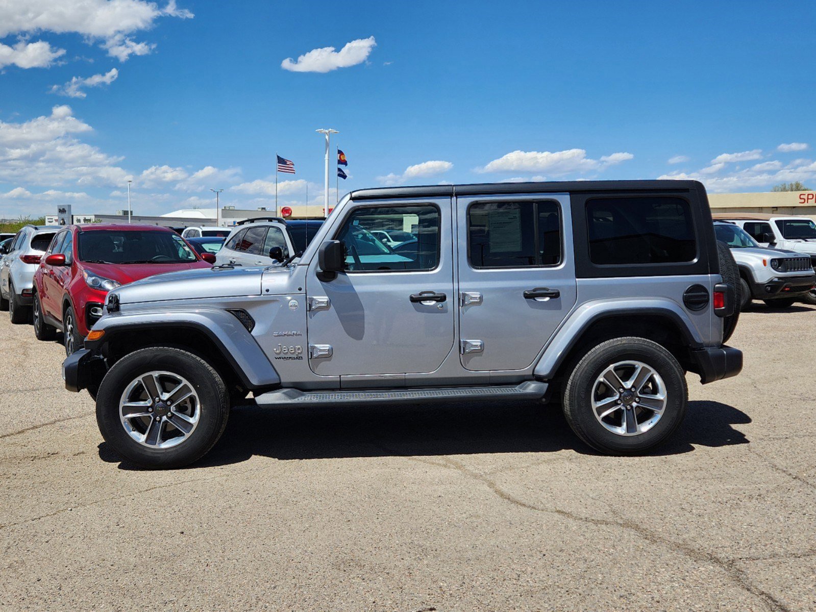 Used 2021 Jeep Wrangler Unlimited Sahara with VIN 1C4HJXEN3MW646147 for sale in Pueblo, CO