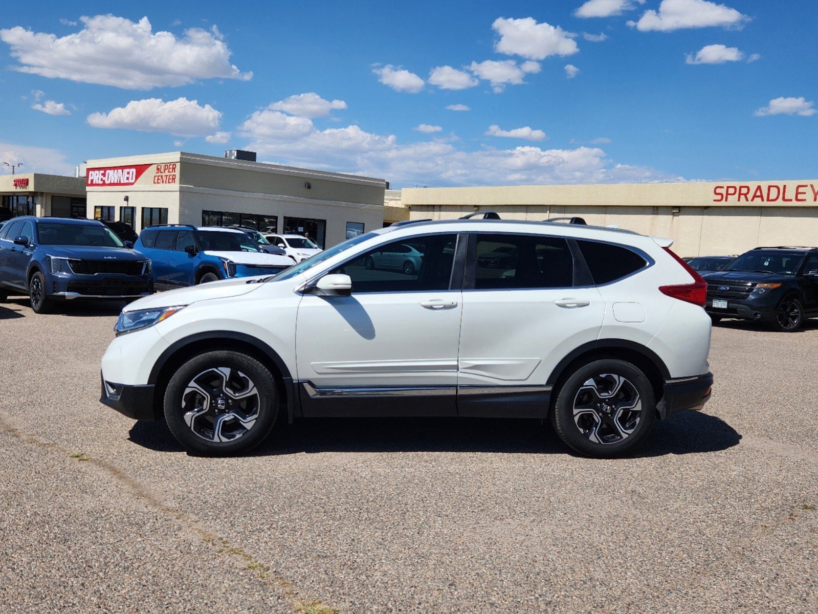 Used 2017 Honda CR-V Touring with VIN 2HKRW2H92HH657398 for sale in Pueblo, CO