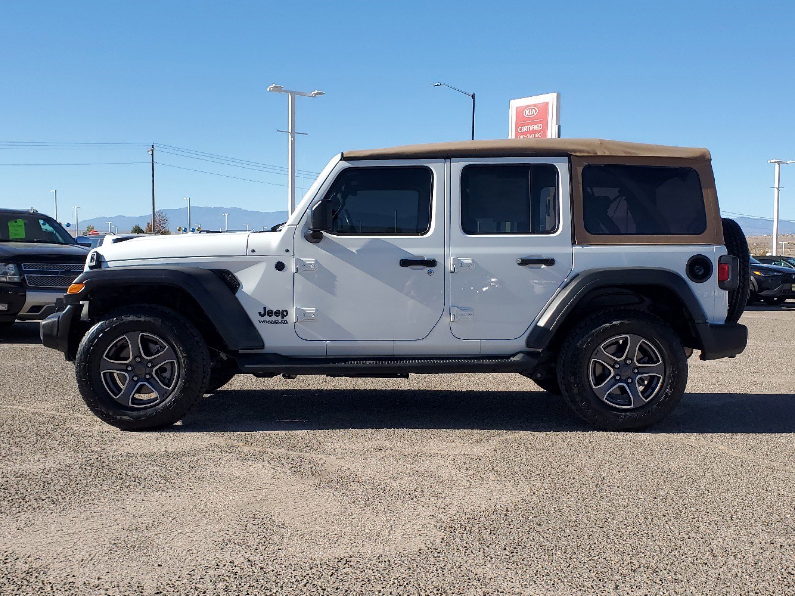 Used 2020 Jeep Wrangler Unlimited Black and Tan with VIN 1C4HJXDG0LW320923 for sale in Pueblo, CO