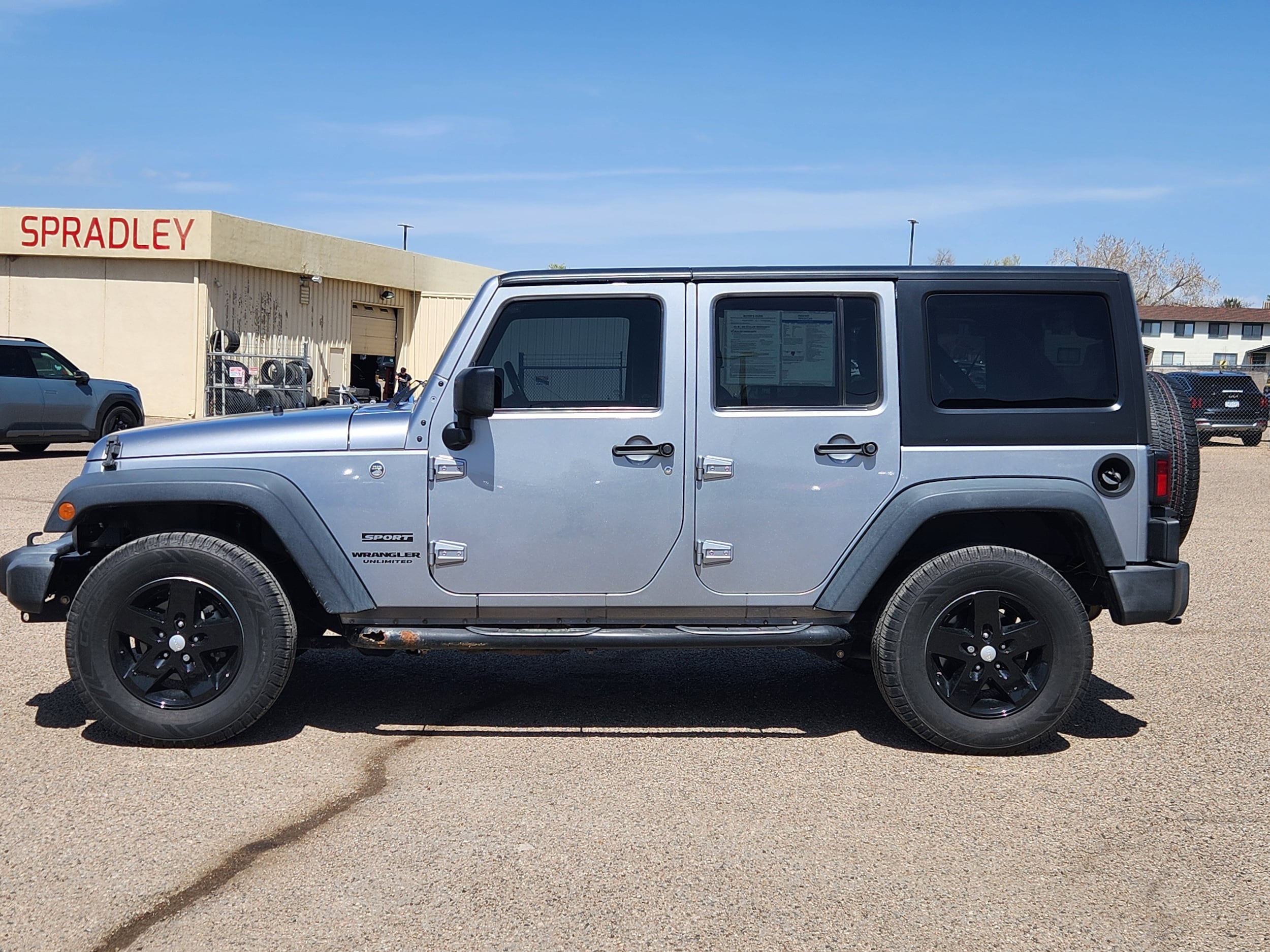 Used 2016 Jeep Wrangler Unlimited Sport S with VIN 1C4HJWDGXGL168974 for sale in Pueblo, CO
