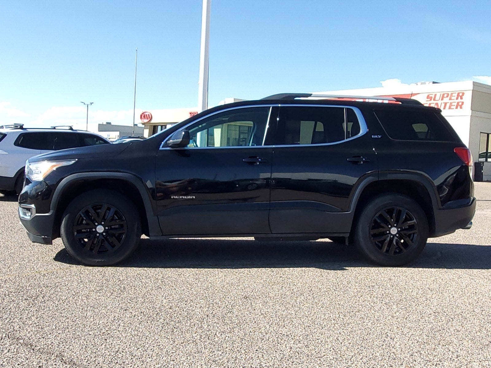 Used 2019 GMC Acadia SLT-1 with VIN 1GKKNULS1KZ263955 for sale in Pueblo, CO