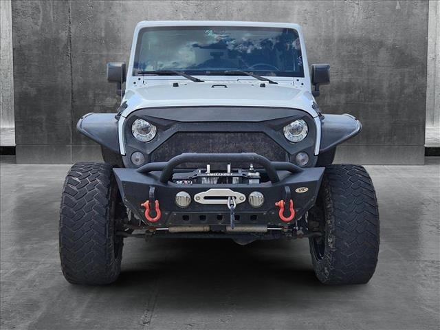 Used 2017 Jeep Wrangler Unlimited Rubicon with VIN 1C4BJWFG1HL612795 for sale in Spring, TX