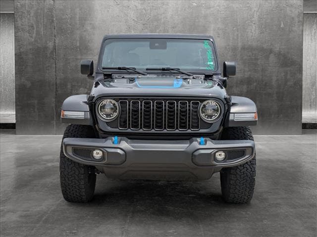 Used 2024 Jeep Wrangler 4xe Rubicon 4XE with VIN 1C4RJXR61RW240267 for sale in Spring, TX