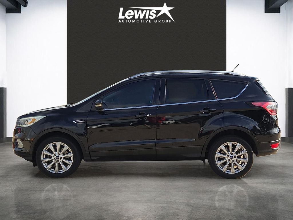 Used 2017 Ford Escape Titanium with VIN 1FMCU0J94HUB60171 for sale in Springdale, AR