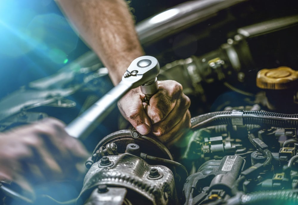 Mechanic Servicing Vehicle