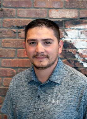 Staff member Adrian Vargas from db2bde05269b