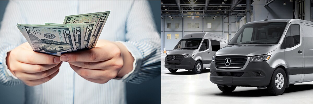 Person holding money and two sprinter vans in a garage
