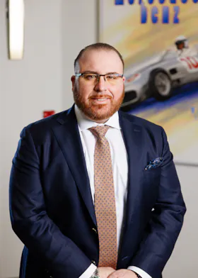 Staff member Michael Livia from 3e102a039518