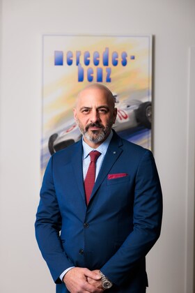 Staff member John Bruno from 65913889fd6e