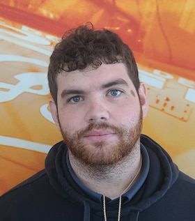 Staff member Zachary Olson from 3105e5e15a7d