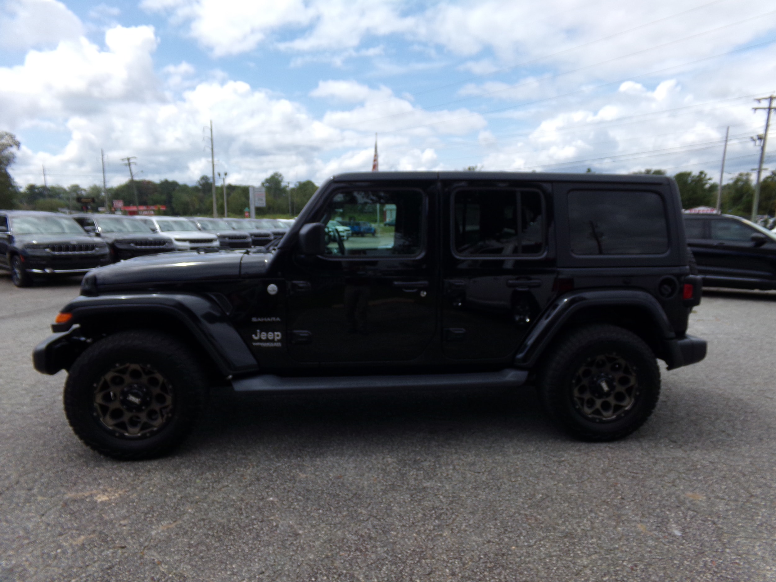 Certified 2018 Jeep All-New Wrangler Unlimited Sahara with VIN 1C4HJXEG3JW114734 for sale in Thomasville, GA