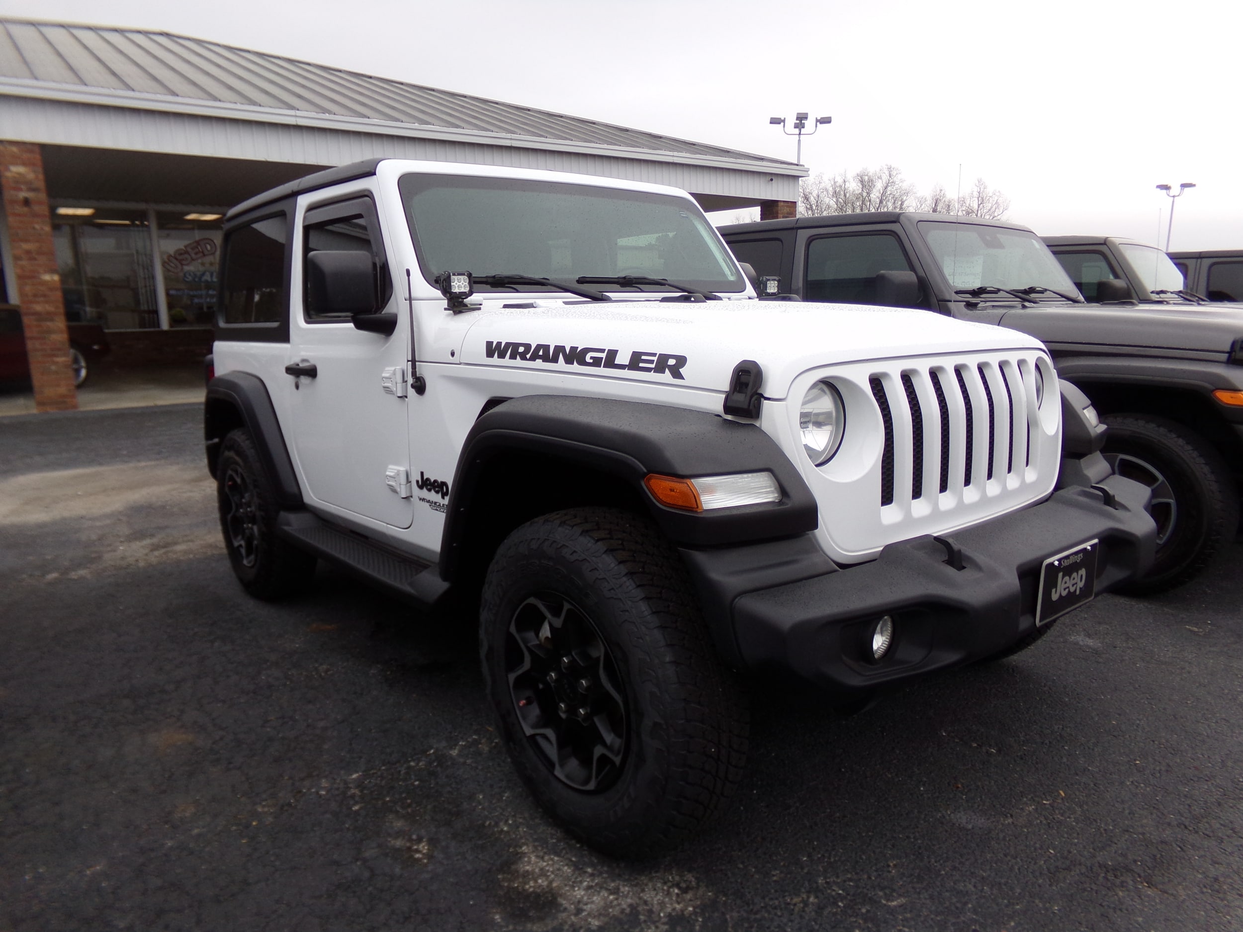 Used 2021 Jeep Wrangler Sport S with VIN 1C4GJXAN0MW752797 for sale in Cairo, GA