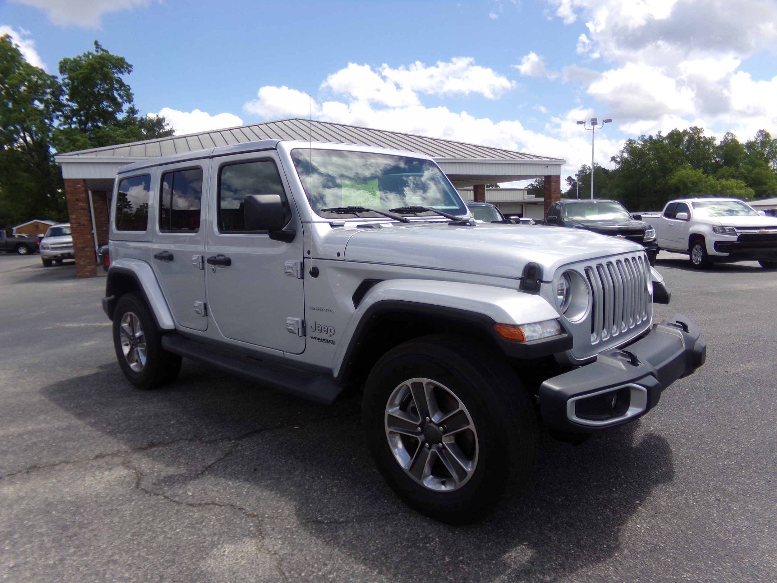 Used 2022 Jeep Wrangler Unlimited Sahara with VIN 1C4HJXEG1NW233081 for sale in Cairo, GA