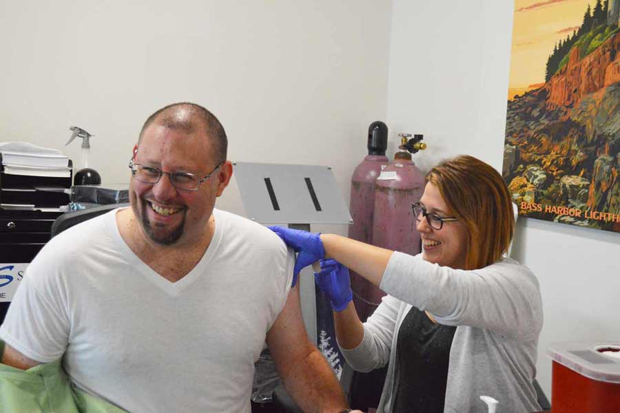 John laughs his way through his inoculation