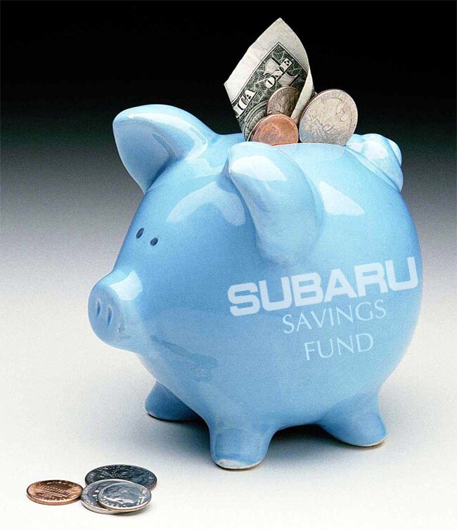 Blue piggy bank overflowing with money and labeled Subaru Savings Fund