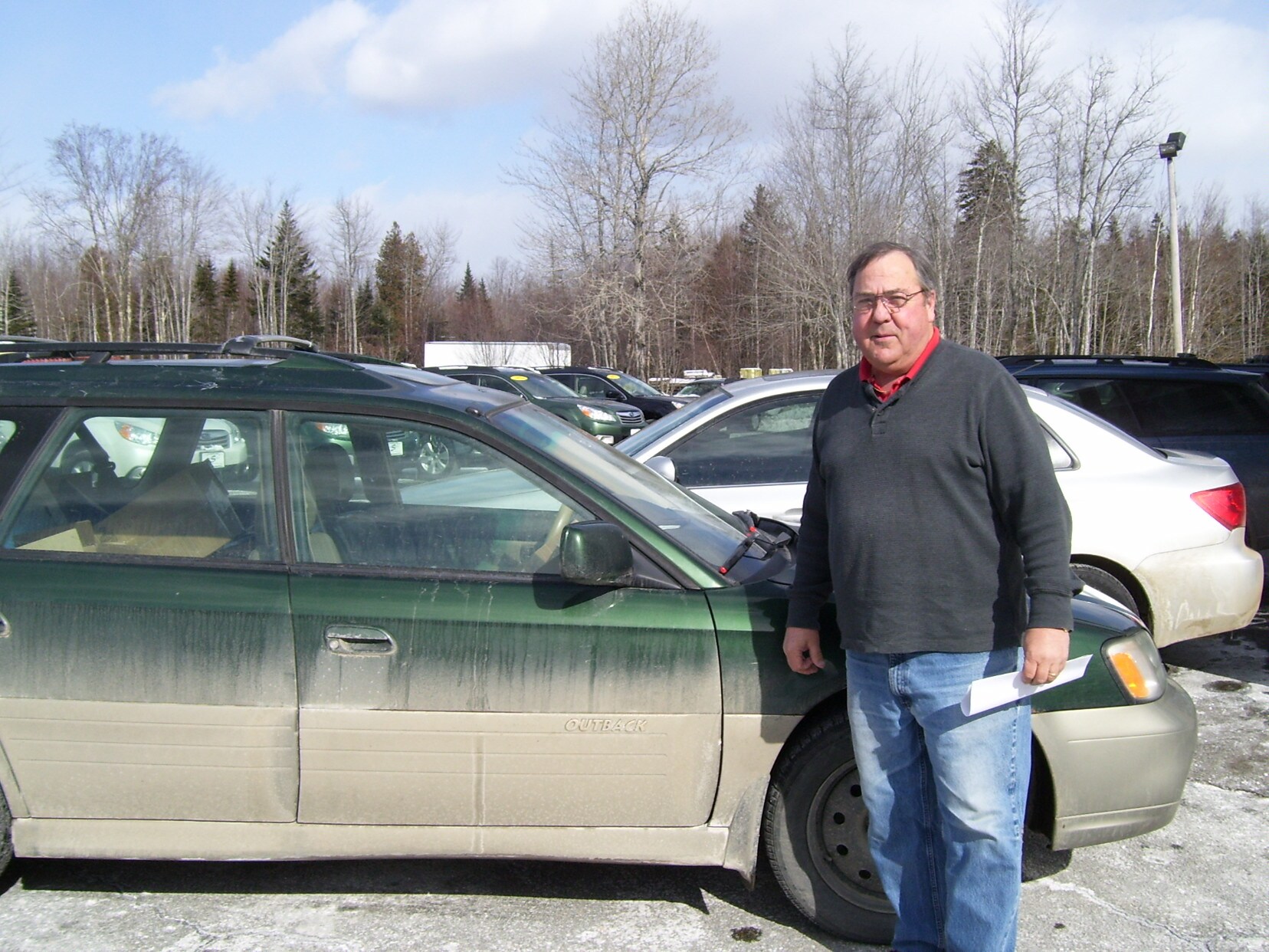 Man with his 700k Outback