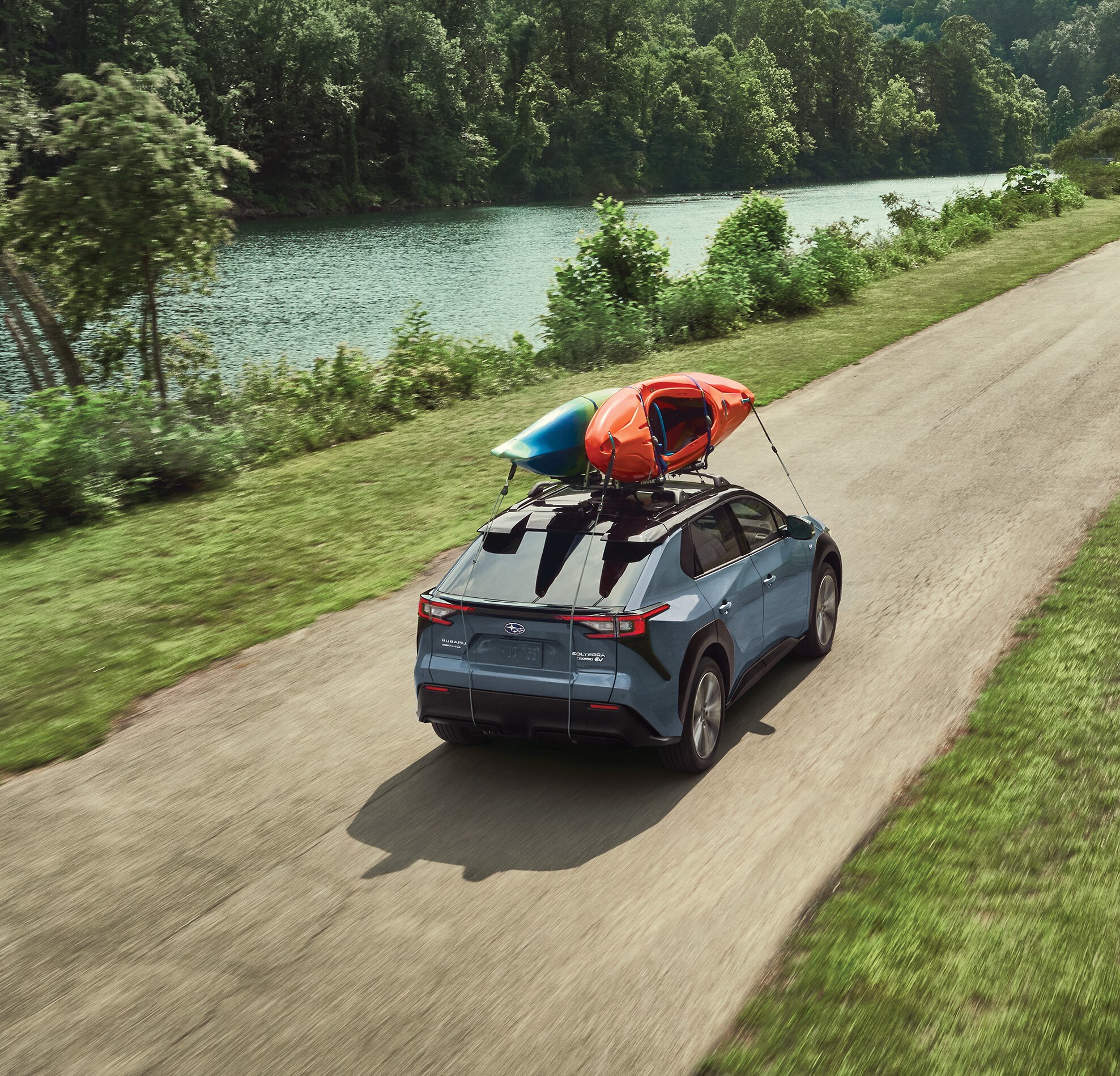 Subaru Solterra with kayaks on roof rack