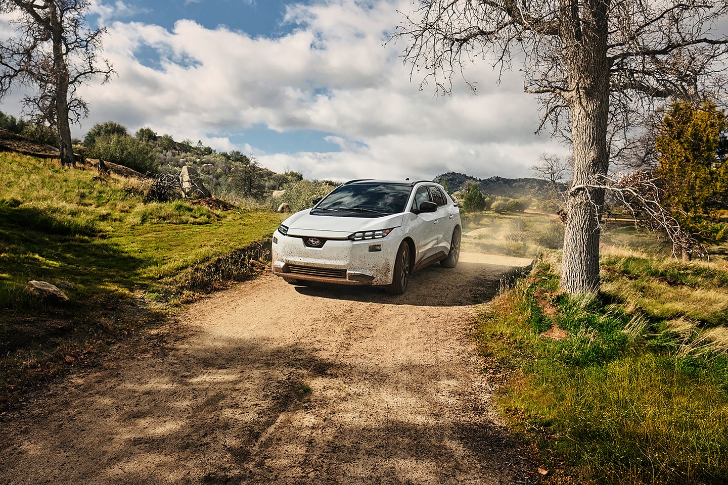  2026 Subaru Solterra driving on dirt road