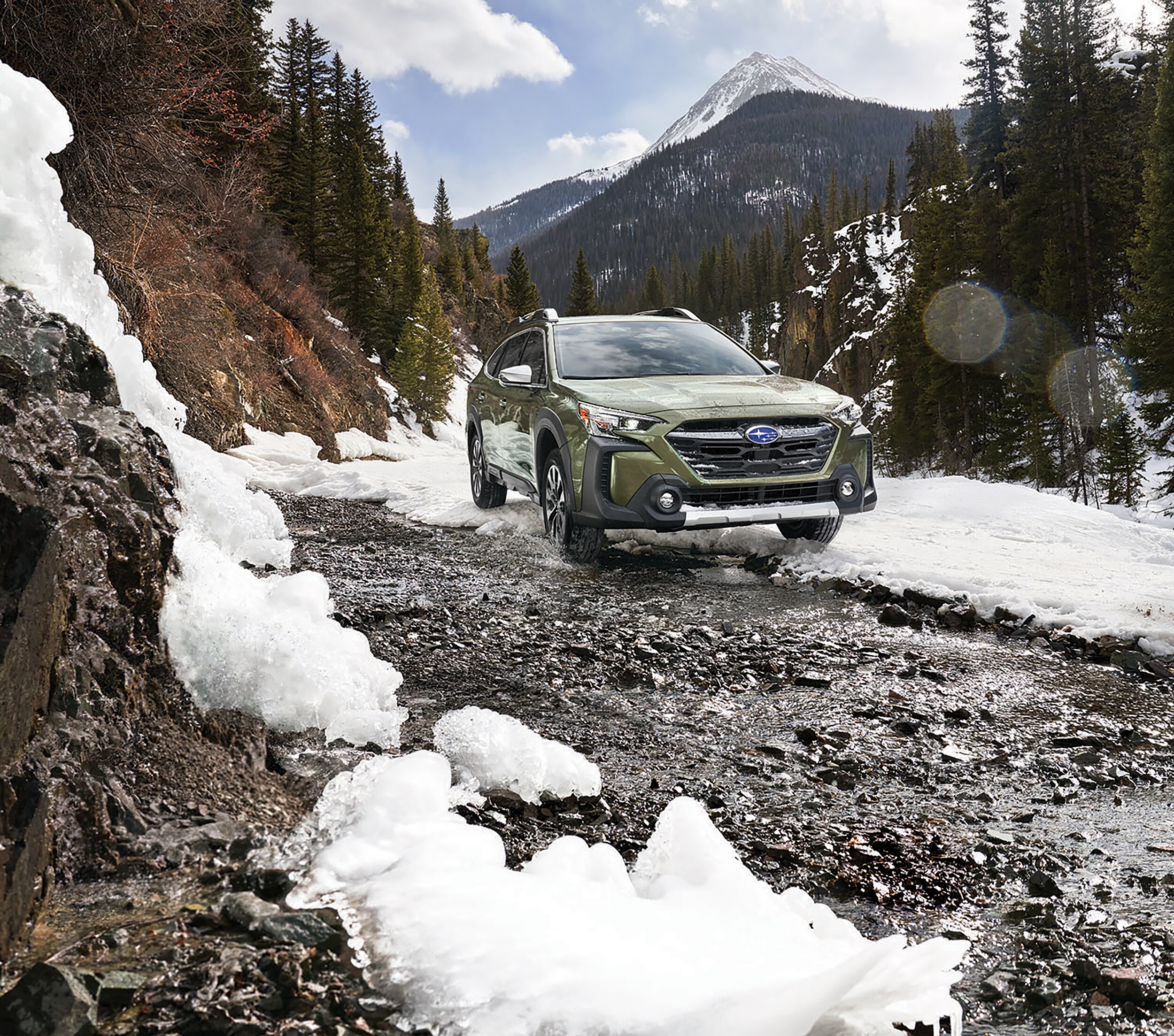 Subaru Outback on rocky trail
