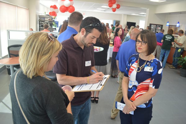 Doctors Megan and Derek Pinkham sign up for our Champion the Cure team