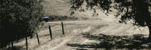 Animated gif of WRX making a hairpin turn on a dirt road