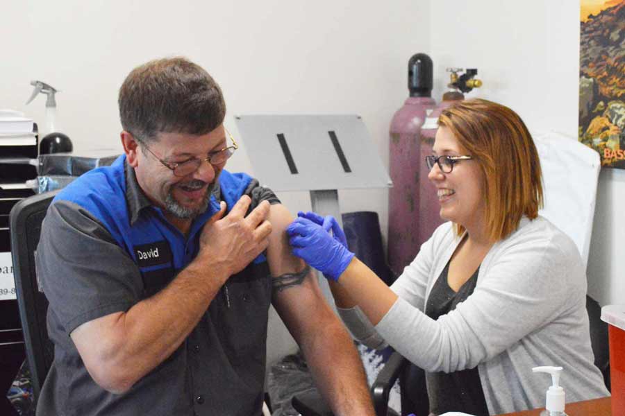 Parts Manager David getting his flu shot