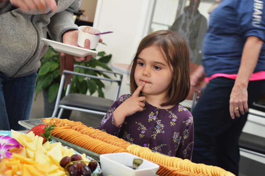 Child choosing her party platter