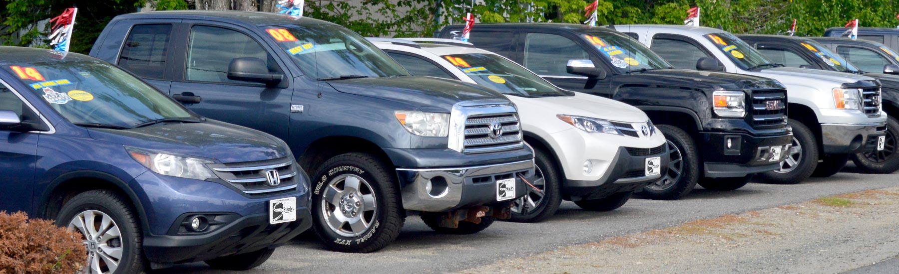 line of used vehicles