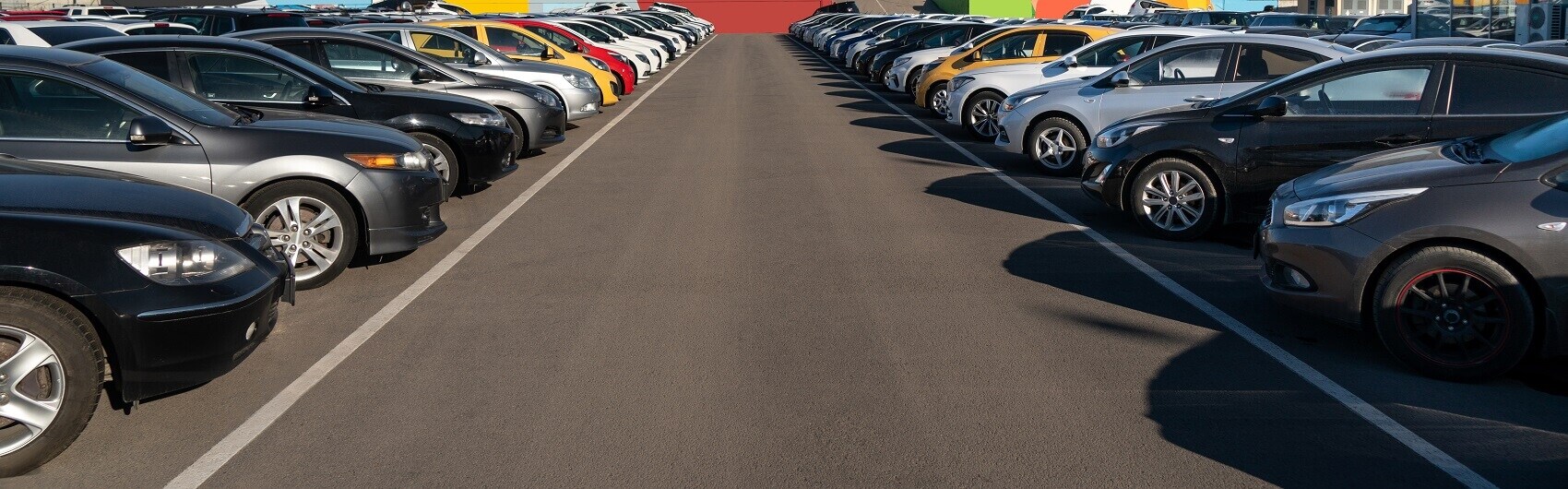 Car Lot with Various Cars